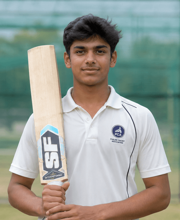 Young cricketer holding a bat